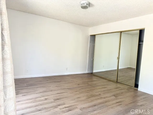 Main bedroom with mirror closet door