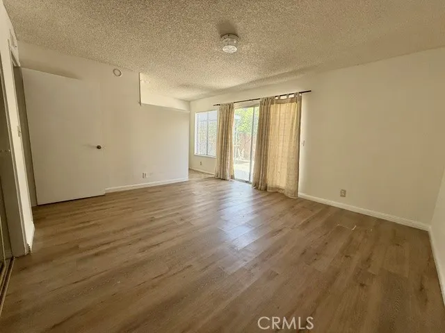 Main bedroom with  sliding door leads to backyard