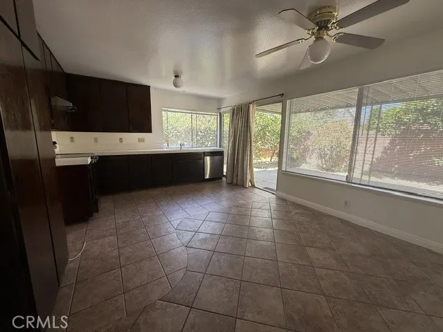 Spacious kitchen with sliding door leads to backyard