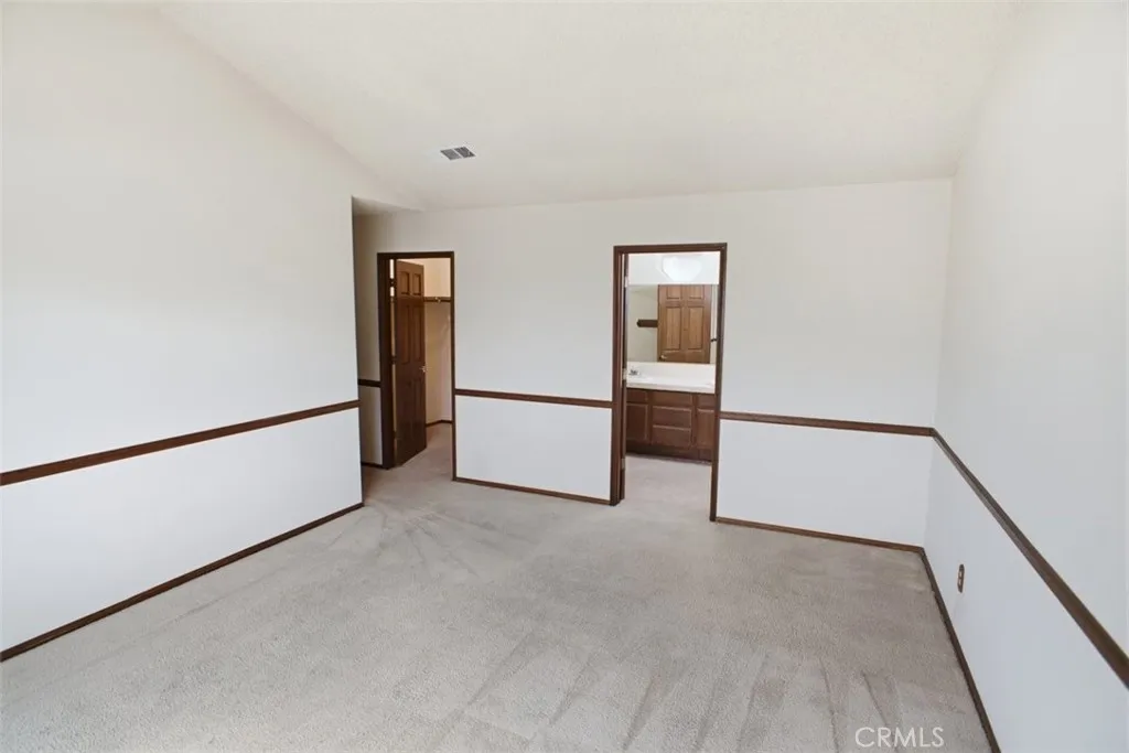 Primary Suite to Walk-in Closet and Bathroom