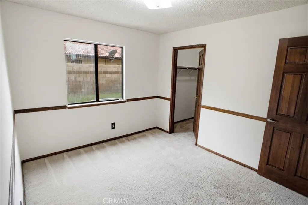 Main Floor Bedroom with Walkin Closet