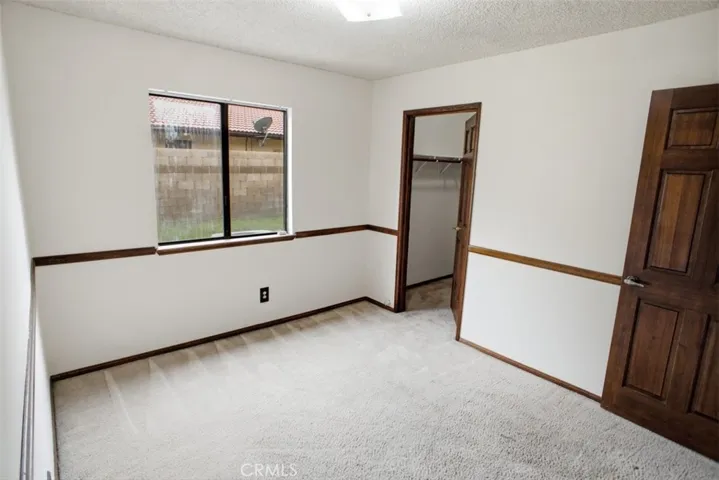 Main Floor Bedroom with Walkin Closet