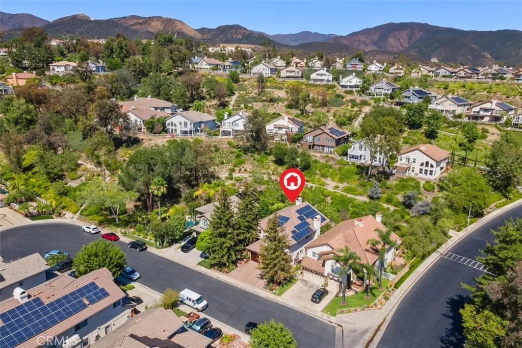 Ideally situated on a cul de sac street and backing to a lush private slope, this exceptional home enjoys a coveted setting within the guard gated community with sweeping Saddleback Mountain views in every direction. Surrounding trails and thoughtfully landscaped neighboring properties reflect the pride of ownership and natural beauty that define this remarkable neighborhood.