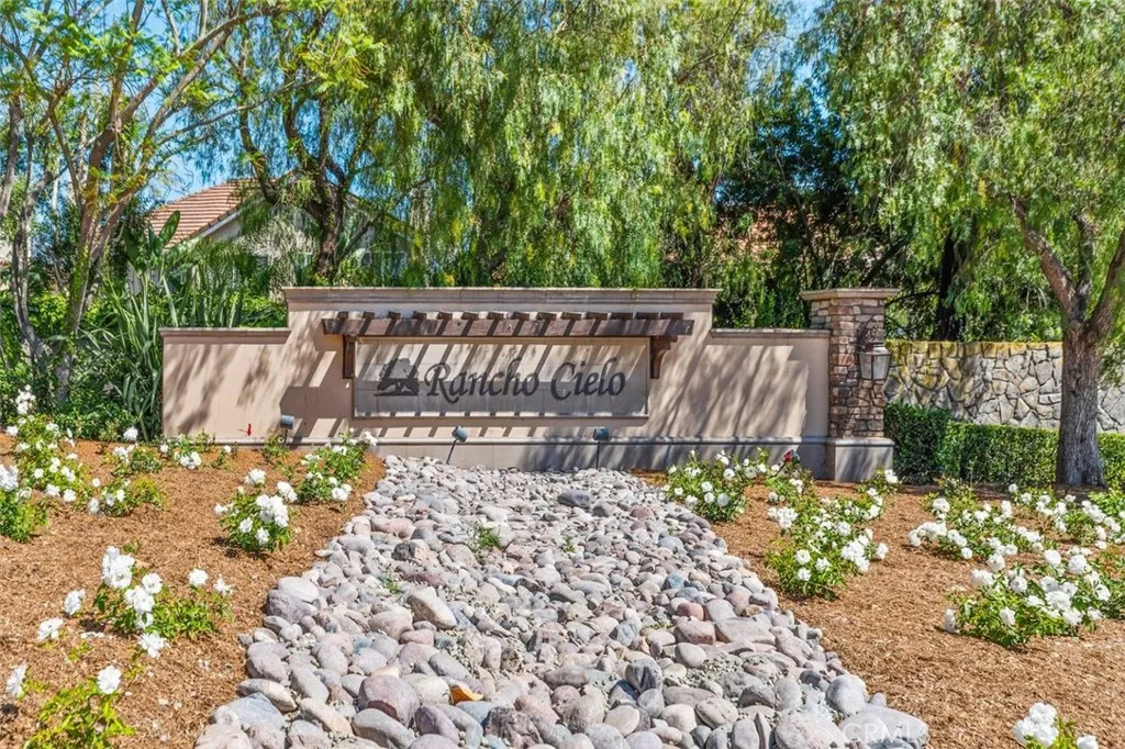 Welcome to Rancho Cielo, a prestigious guard gated community framed by mature trees, lush landscaping, and a beautifully appointed entrance. This sought after neighborhood offers an exceptional lifestyle with resort style amenities, scenic trails, and stunning Saddleback Mountain views just moments from your front door.