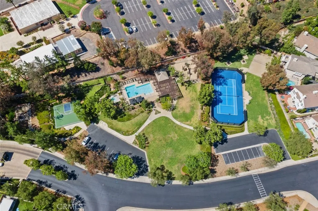 Showcasing the outstanding Rancho Cielo community amenities including a sparkling pool and spa, tennis court, basketball court, park and green space all set within a beautifully landscaped and meticulously maintained setting.