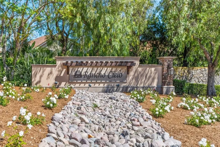 Welcome to Rancho Cielo, a prestigious guard gated community framed by mature trees, lush landscaping, and a beautifully appointed entrance. This sought after neighborhood offers an exceptional lifestyle with resort style amenities, scenic trails, and stunning Saddleback Mountain views just moments from your front door.