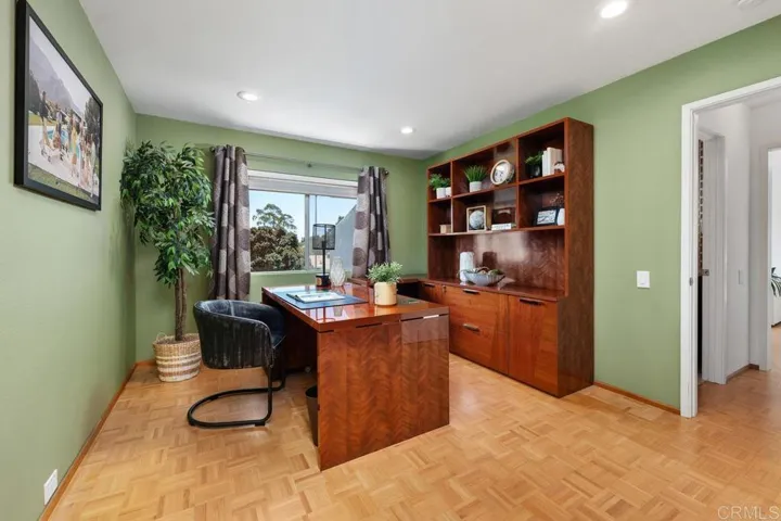 This room off the living room can be used as a bedroom or an office. Full bath attached.