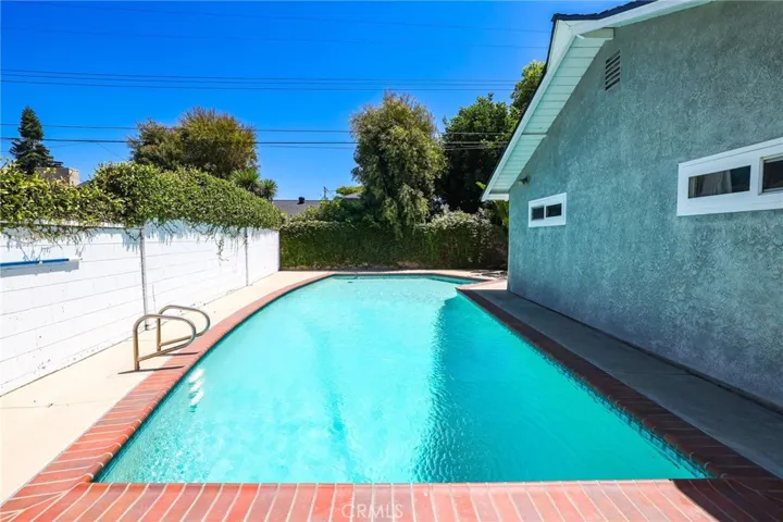 Heated pool is well maintained and has updated pool equipment.