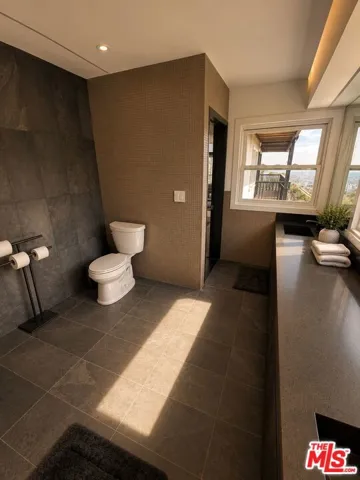 Primary bathroom featuring a s