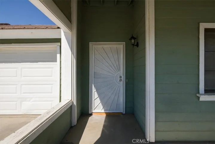 Covered front porch with security screen