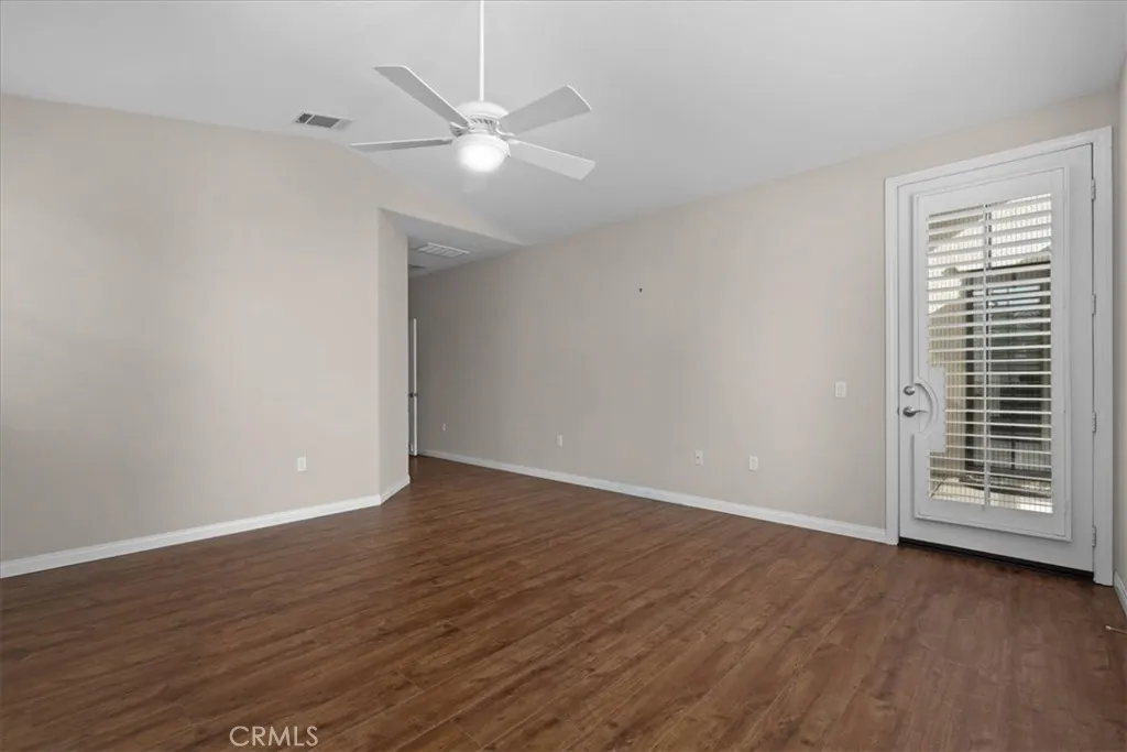 Primary Bedroom with French Door to Backyard