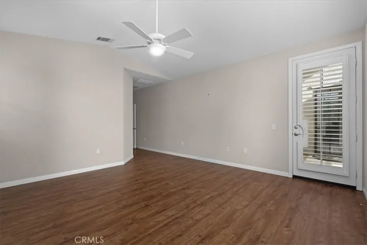 Primary Bedroom with French Door to Backyard