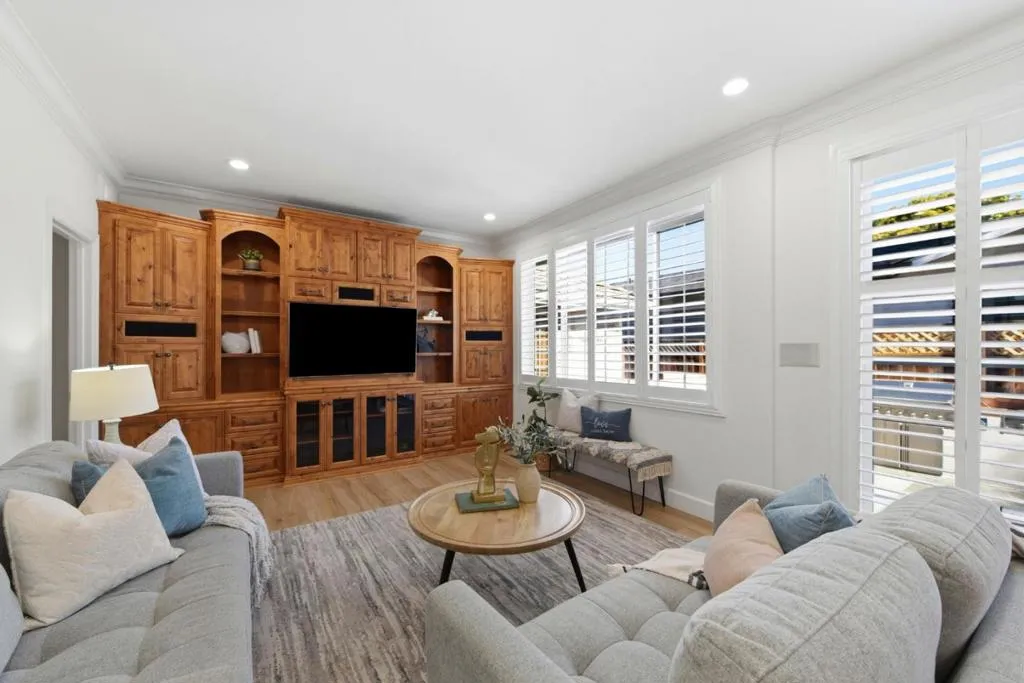 Spacious family room with access to the backyard.