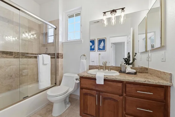Upstairs full bathroom. New paint and lighting.