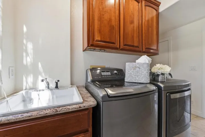 New paint and lighting. Utility sink with granite.