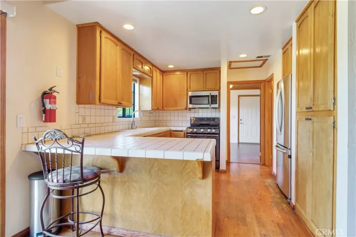 Kitchen, Bathroom to right, Bedroom in rear with exterior access upper level