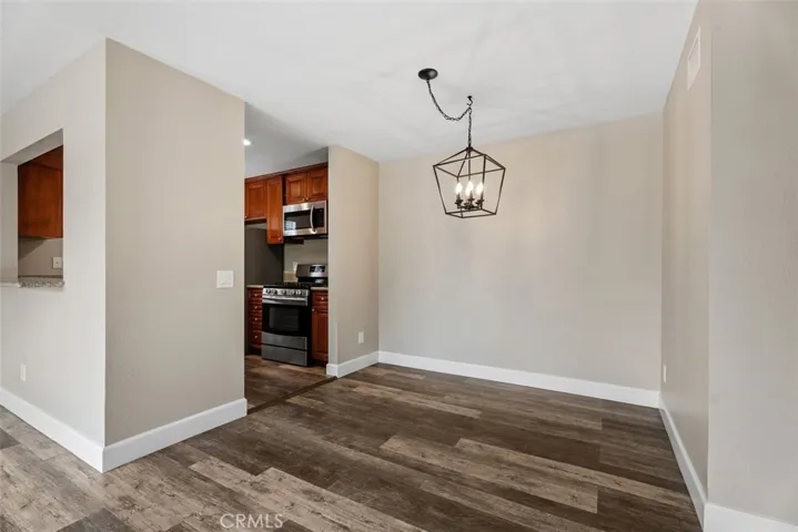 Dining adjacent totkitchen and living room
