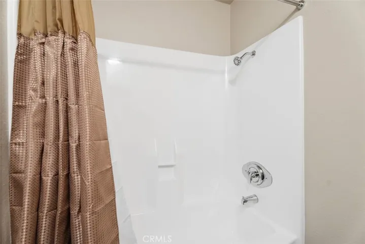 Pristine full bath with refinished tub/shower and new fixtures