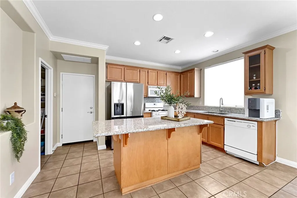Large kitchen pantry with direct garage acces