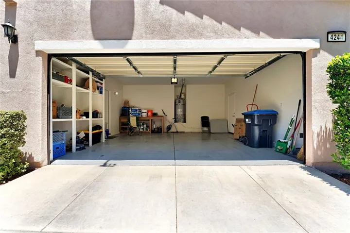 Two-car side -by-side garage with epoxy flooring