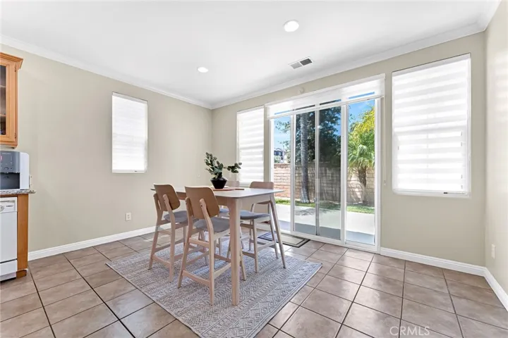 Direct backyard from kitchen and dinning
