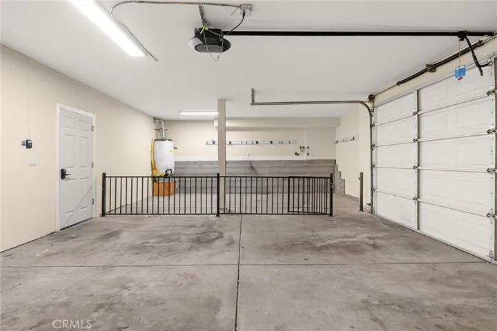 Additional space in the garage for golf cart or maybe a shop?