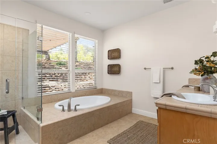 Great walk-in shower, soaking tub with garden window and lots of privacy!