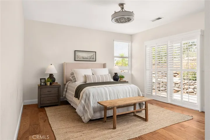 Spacious Primary Bedroom Suite with easy backyard patio access!