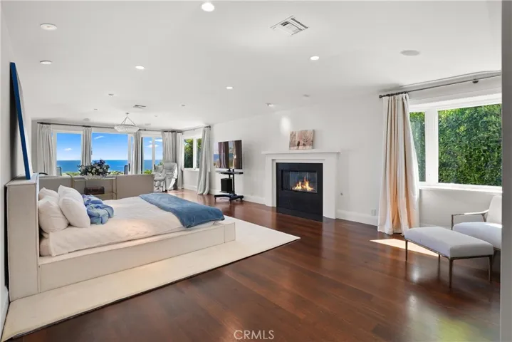 Primary Bedroom with Fireplace and Ocean Views
