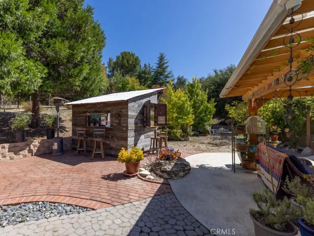 ...a cabana to house outdoor cooking and entertainig...