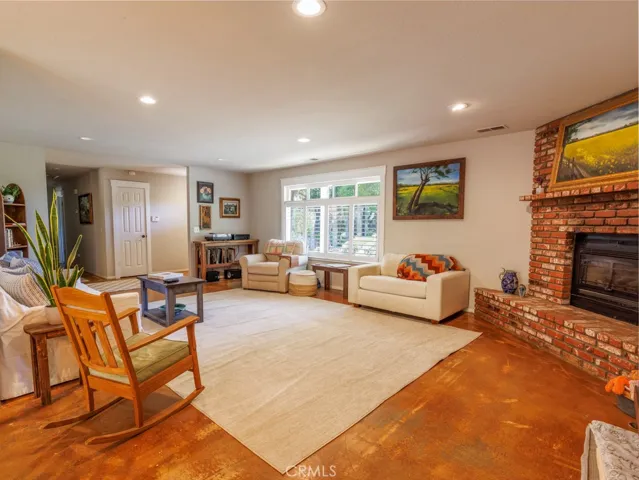 ...anchored by a brick fireplace...