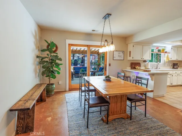 ...dining area opening to the covered patio...