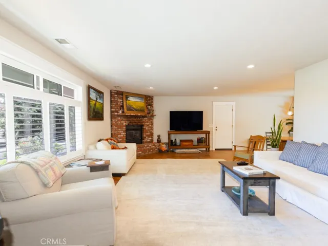 ...large liviing room with finished concrete flooring...