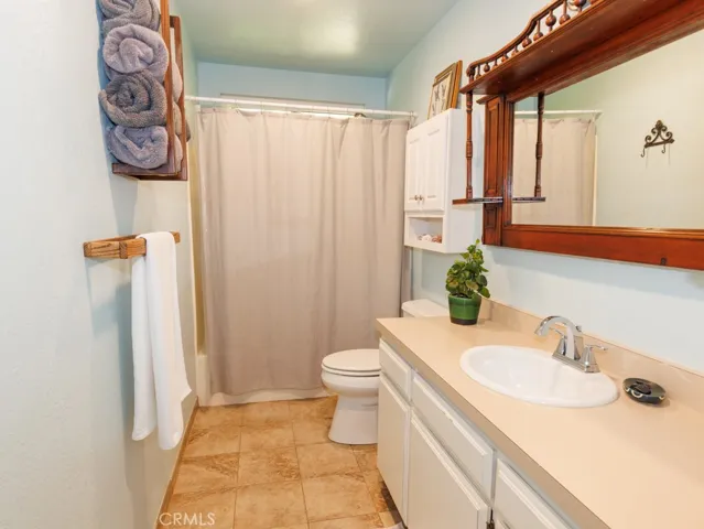 ...hall bath with shower over tub...