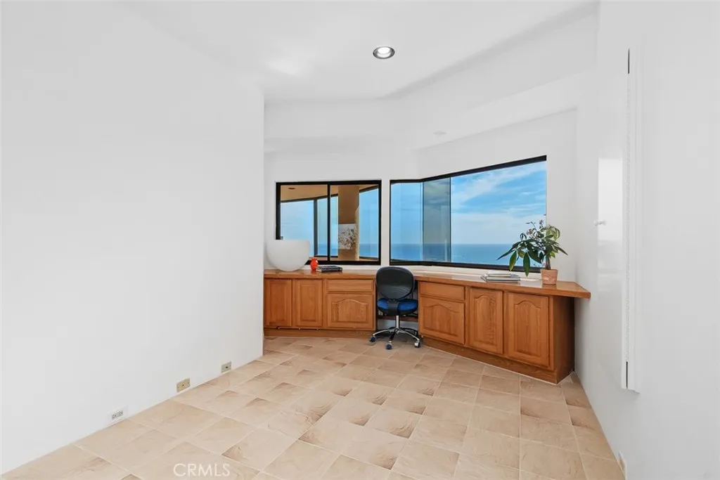 Second level possible 3rd bedroom, used as craft room but has closet with mirrored doors and gorgeous views.