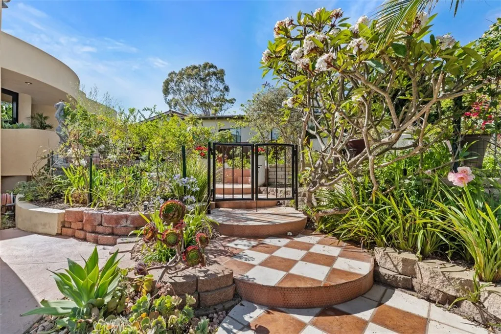 Front walkway leads to front door and garden.