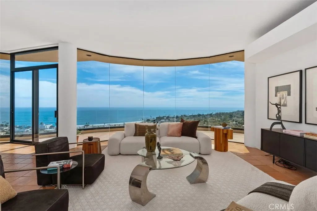 One can see the Hotel Laguna and coastline clearly from this room.