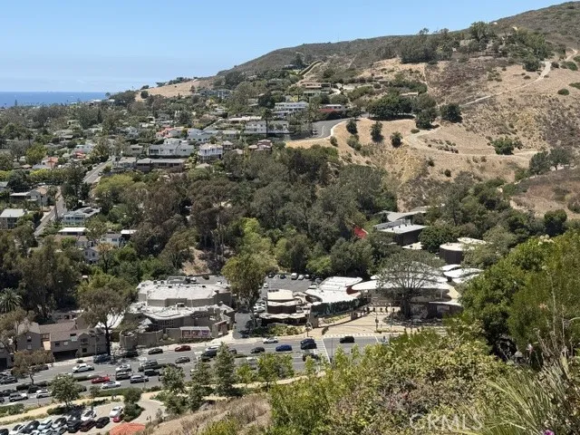 Views towards the Festival of Arts with the Pageant of the Masters and Laguna Playhouse. During festival season, sounds of music can be heard.