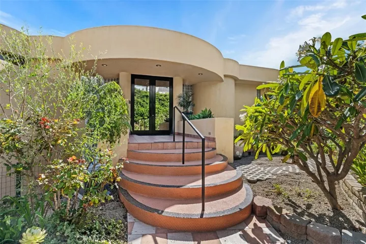 Double door entry into top level of house.