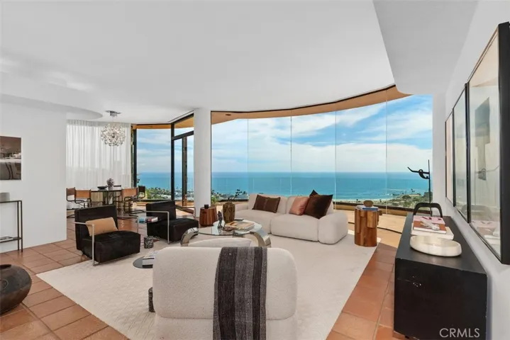 Living room with walls of glass for constant views.