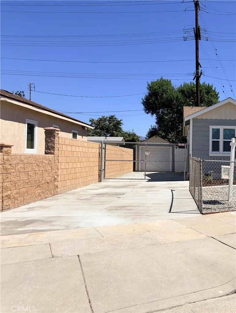 New almost 65 ft cement driveway half behind fence New almost 65 ft cement driveway half behind fence