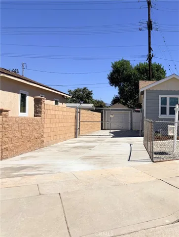 New almost 65 ft cement driveway large enough for 6 cars AND one car garage for toys