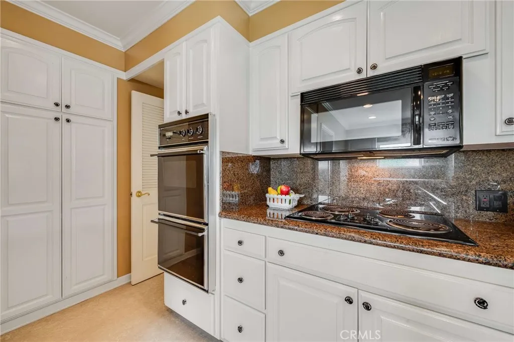 tons of cabinet space and a pantry area