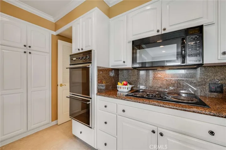tons of cabinet space and a pantry area