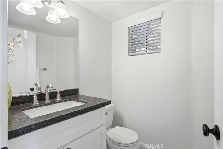 Powder bathroom conveniently located on the main-level