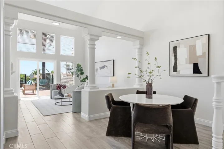 Light-filled dining area flows seamlessly into the inviting living space