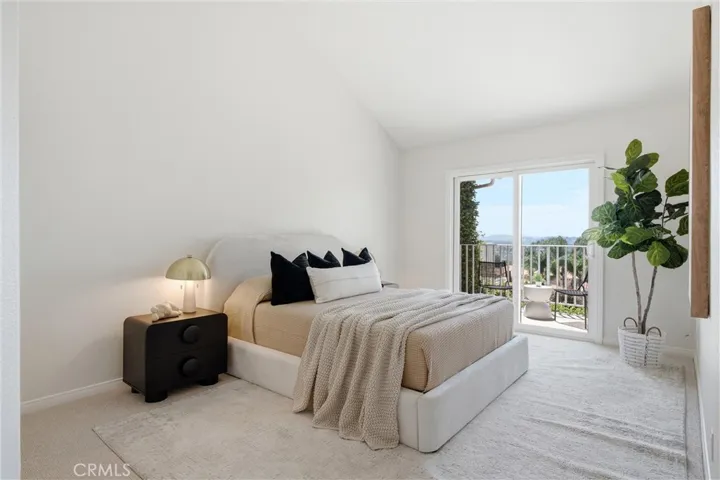 Generous primary suite with direct access to a private viewing balcony