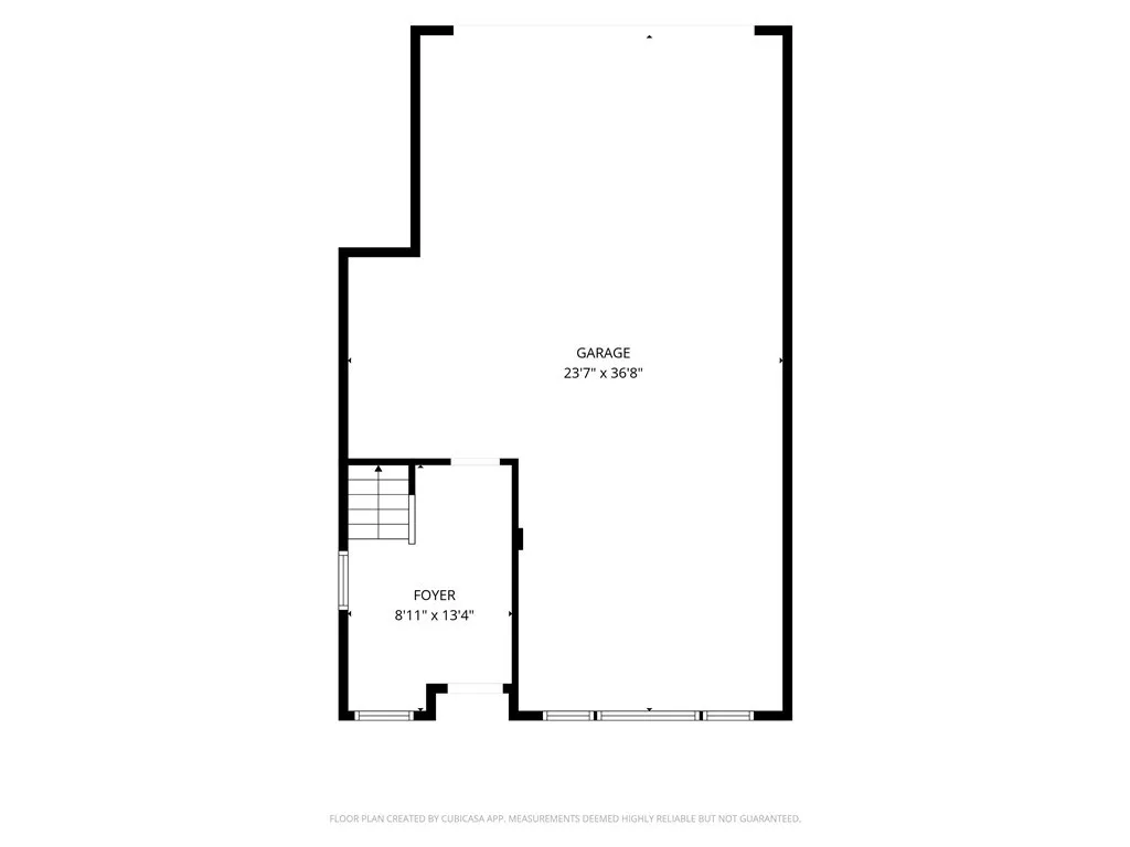 The entry level offers a welcoming foyer and an oversized two-car garage with generous storage space.