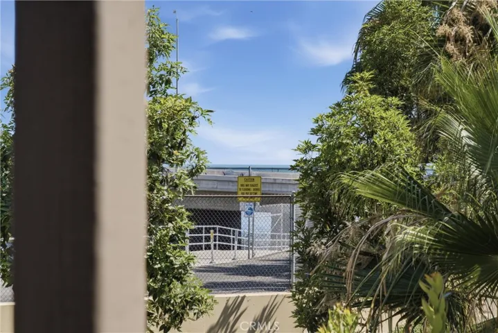 Peekaboo ocean view adds to the home's coastal charm.
