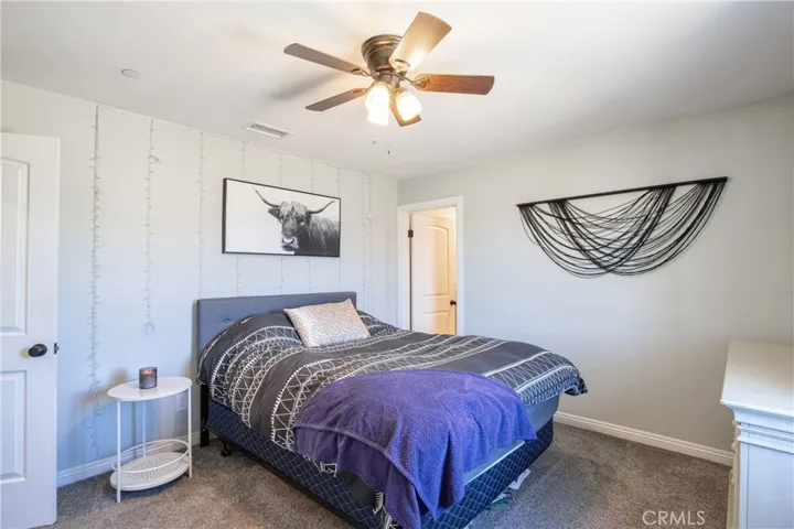 Room with attached full bath.